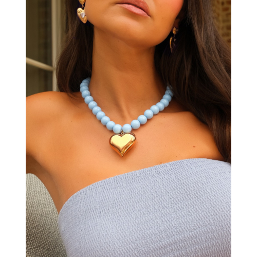 Blauwe kralen ketting met hart goudkleurig