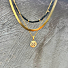 Graveerbare ketting met 4 initials op een coin in het goud
