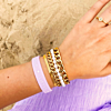 gouden armbanden mix om pols