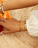 gouden armbanden combinatie
