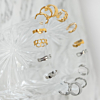 Mix van zilveren en gouden ear cuffs