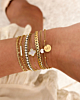Gouden armparty met steentjes