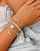 Zilveren armparty met steentjes