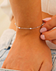Armband met witte schakels zilver
