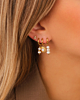 Earparty met parels goudkleurig