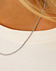 Zilveren ketting gedraaid