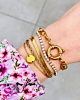 Tennis armband om pols met roze mouwtje