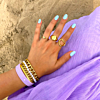 Gouden armbanden met ringen