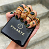 Gouden en zwarte ringen mix