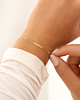 Mini snake armband goudkleurig om pols