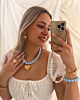 Blauwe kralen ketting met hart goudkleurig