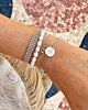 Zilveren armparty met parels