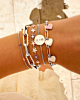 Zilveren armparty met roze details