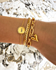 Gouden armparty met gravering