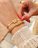 Gouden armparty strik en chain