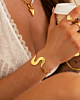 Bangle swirl in het goud