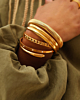Gouden bangle armparty