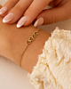 Armband goud met 4 hartjes