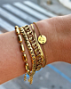Gouden armparty met schakelarmbanden