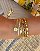 Gouden armparty met chains
