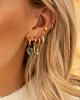 Gouden earparty met groene details