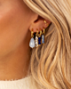 Gouden earparty met blauwe details