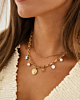 Gouden necklaceparty met schakels en bedels