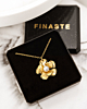 Gouden bloemetjes ketting in sieradendoosje