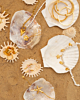 Gouden sieraden mix zomer