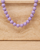 Paarse kralen ketting