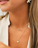 Zilveren necklaceparty met strikje en hartje