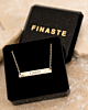 Zilveren bar ketting met initials in sieradendoosje