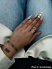 Gold wavy ring.
