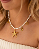 parelketting met beachy bedels