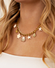 gouden bedelketting met beach bedels
