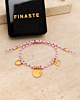 gouden armbandje met gouden bedeltjes met sieradendoosje