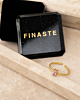 gouden ring met roze steentje en sieradendoosje