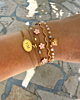gouden gekleurde armparty