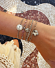 Zilveren armparty met hartjes en bloemetjes