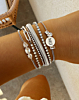 Zilveren armparty met steentjes