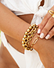 Chunky gouden armbanden mix