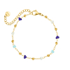 Bolletjes armband met steentjes goudkleurig