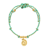 Groen armbandje met schelp bedel goudkleurig