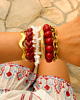 Rode kralen armparty goud