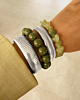 Zilveren armparty met bangles en kralen