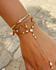 Gouden armparty met steentjes