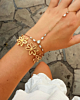 Gouden armparty met bloom en steentjes