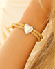 Beige touwtjes armband met hartje zilver