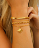 Gouden armparty met chain armbanden