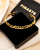 Gouden bangle met hartjes in sieradendoosje